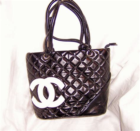 black chanel purse white logo|black chanel purse price.